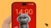 Front view concept render of the rumored iPhone 18 Pro Max held in hand, showing a slim bezel, Dynamic Island, and a custom lock screen featuring an angry grey cat graphic.